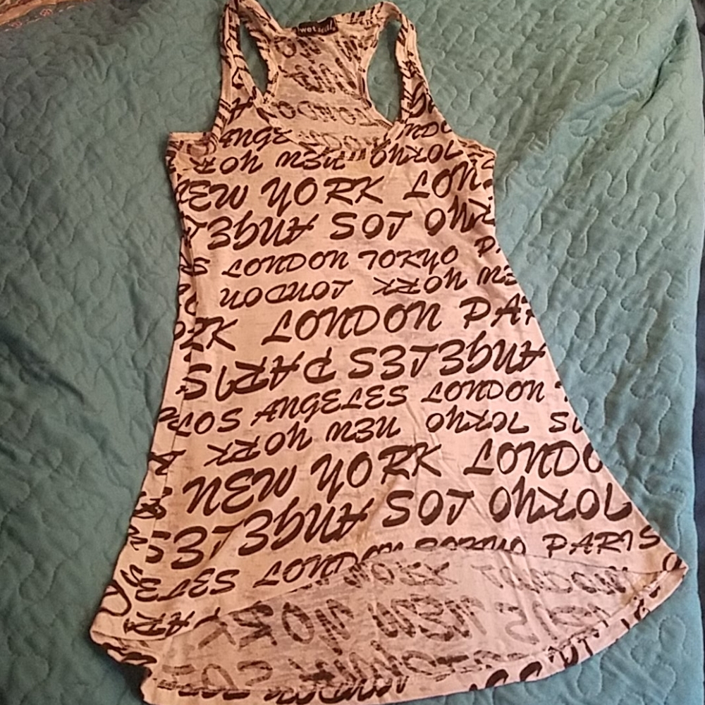 White tank with black lettering